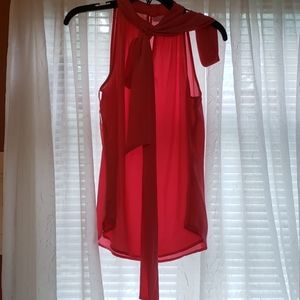 Coral blouse with high neck and tie